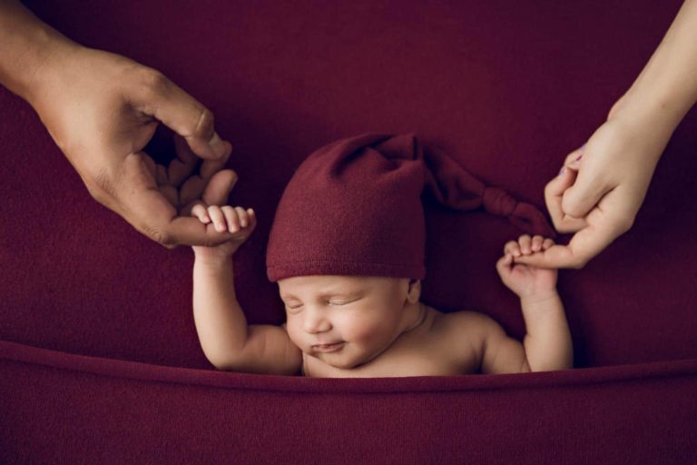 Newborn Photography Melbourne baby hgolding parents hands