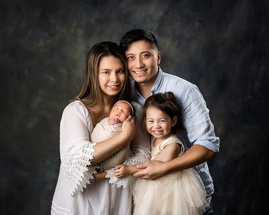 Studio Family Portraits in a Classic Style with a touch of Creativity