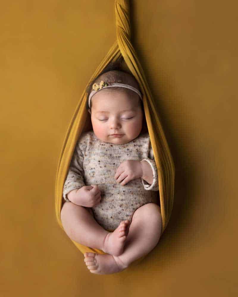 Baby on Yellow - Newborn Photography Melbourne